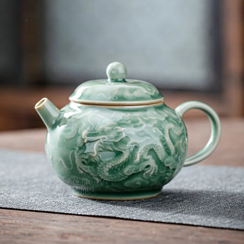 150ml Yue Kiln Celadon Ceramic Teapot Handmade Engraving Dargon Tea Maker Small Teapot with Filter Hole Household Kung Fu TeaSet